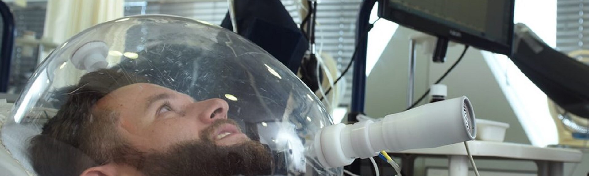 Performing tests for a man lying in a bed